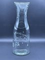 Back side view of hand etched water pitcher showing more etched stars.